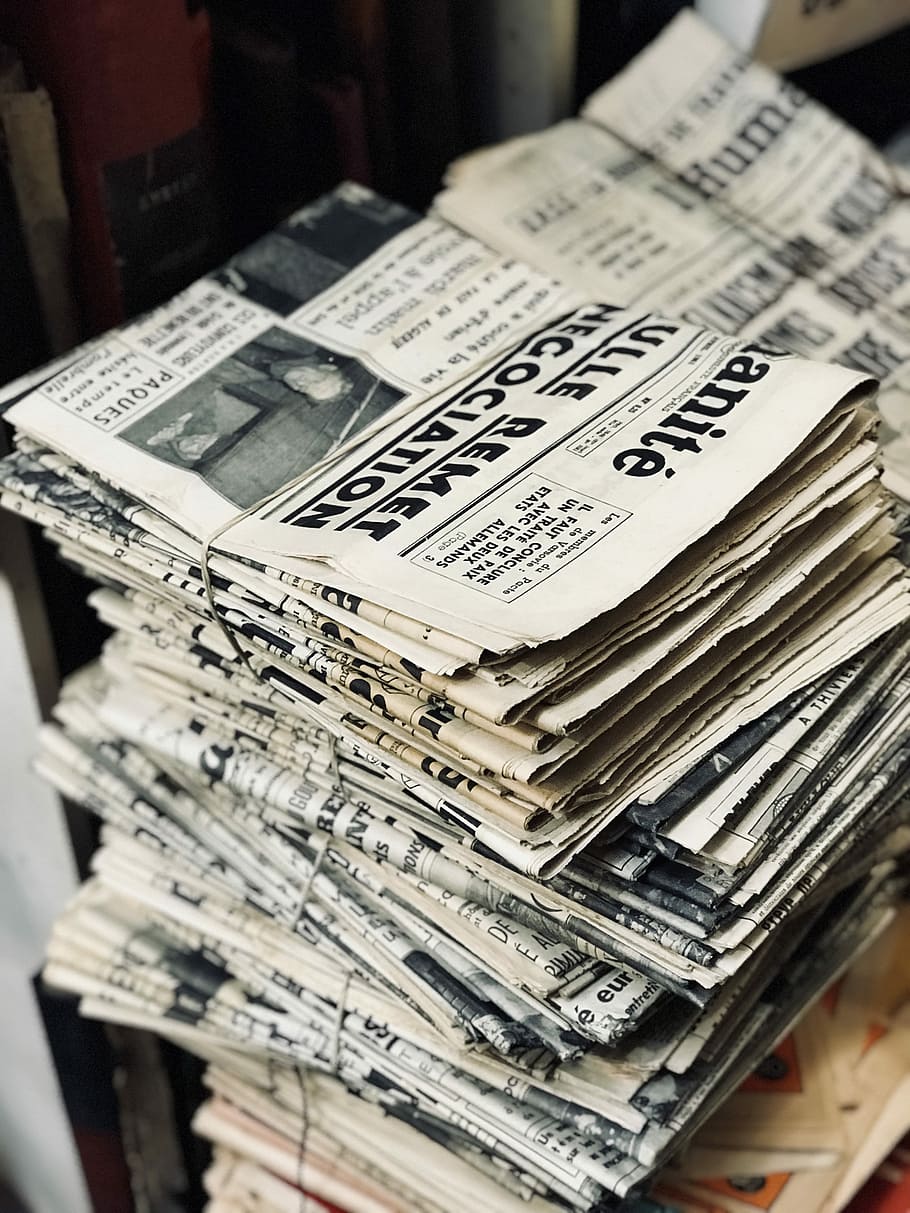 Hd Wallpaper Bundle Of Newspaper On Table Nespaper Lot In Tilt Shift Lens Photography Wallpaper Flare