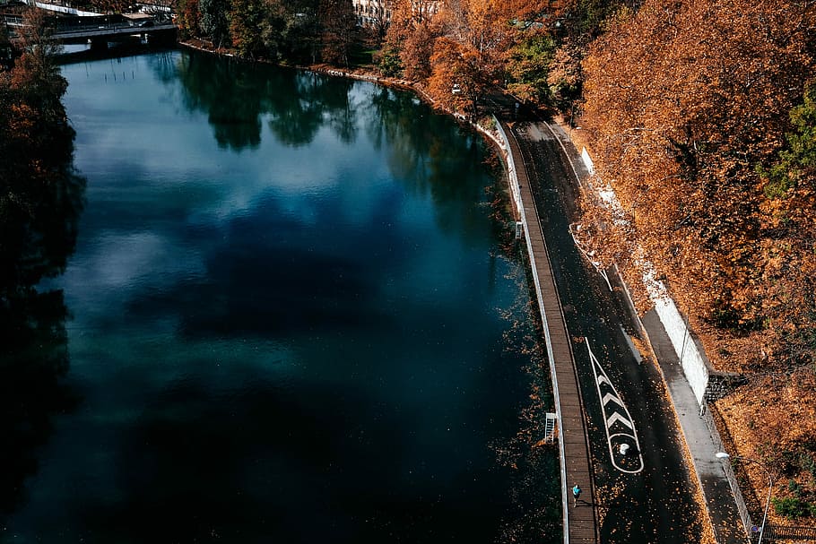 bird's eye view of road beside body of water during daytime, aerial photography of road beside body of water at daytime HD wallpaper