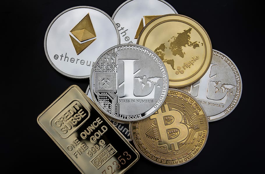 silver and gold-colored coin collection, cryptocurrency, concept