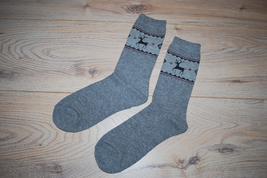 pair of gray socks placed on brown wood, two, grey, deep, wool HD wallpaper