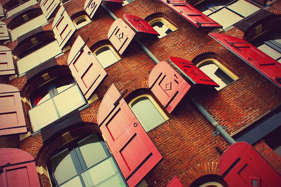 brown brick building with opened red wooden windows during daytime, red wooden windows HD wallpaper