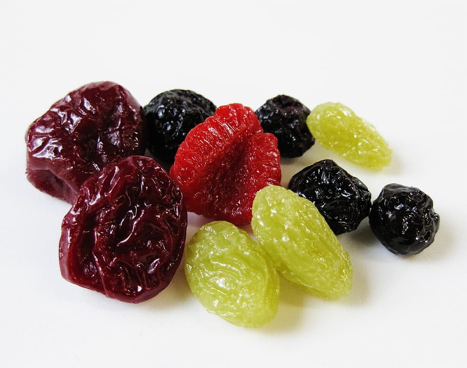 green, brown, and black raisins on white surface, dried, fruit HD wallpaper