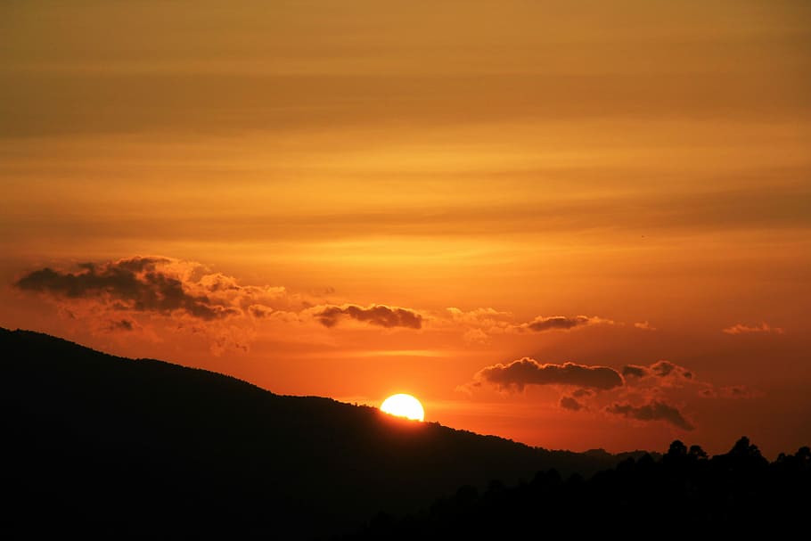 sun behind silhouette of a mountain, photo of sun during golden hour HD wallpaper