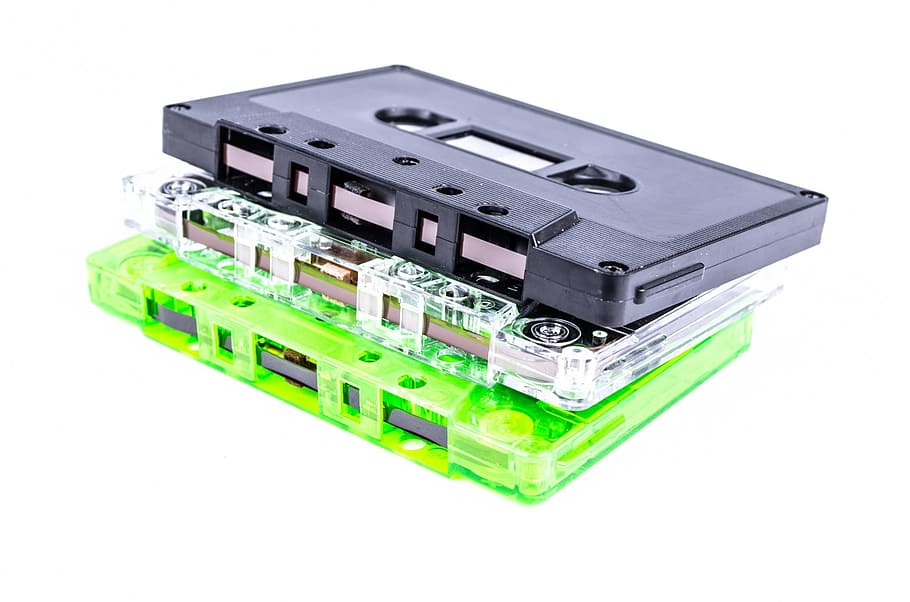 green, white, and black cassette, announcer, audio, communication