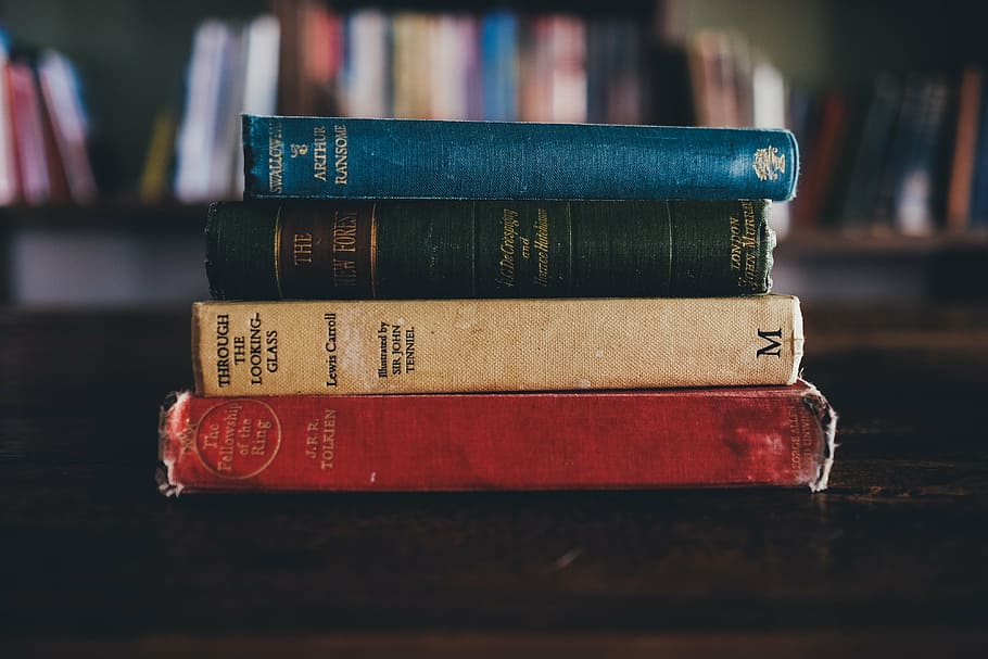 photo of four assorted-title books, library, through the looking glass, HD wallpaper