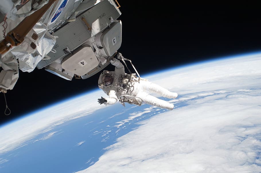 astronaut in space, international space station, space walk, iss