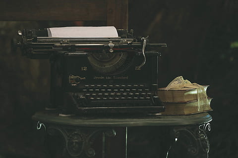 Old typewriter and books on a table, technology, vintage, old-fashioned HD wallpaper