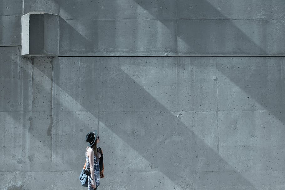 woman standing beside gray wall, hipster, hippie, emo, concrete HD wallpaper