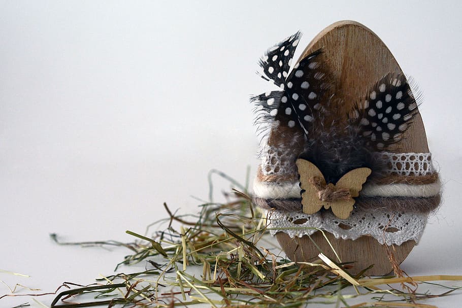 brown wooden Easter egg, decor, feather, easter decoration HD wallpaper