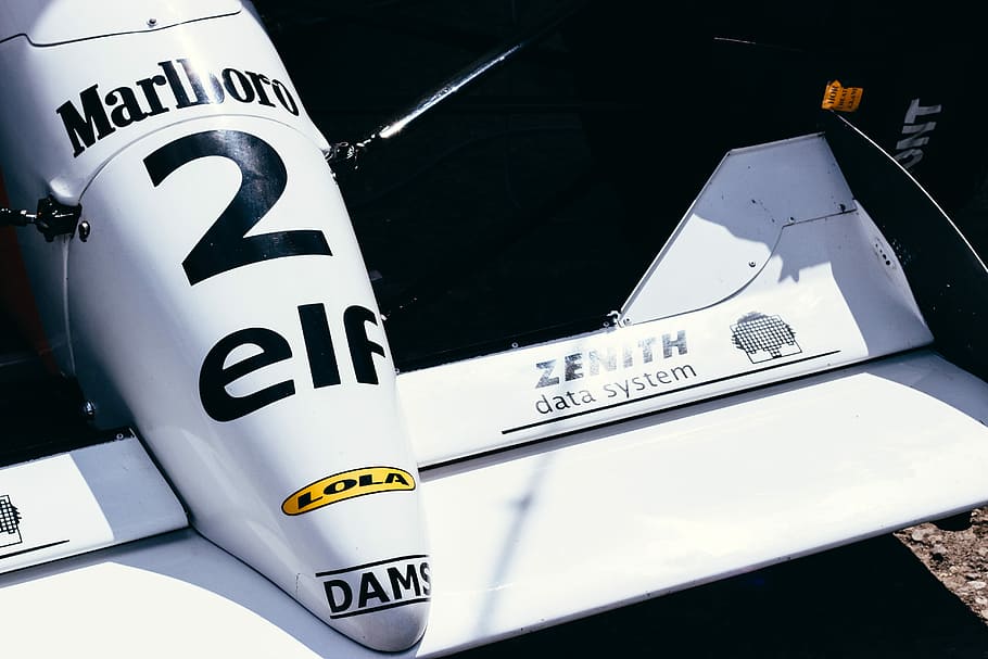 white Marlboro 2 Elf Formula 1 racing car, white and black plane