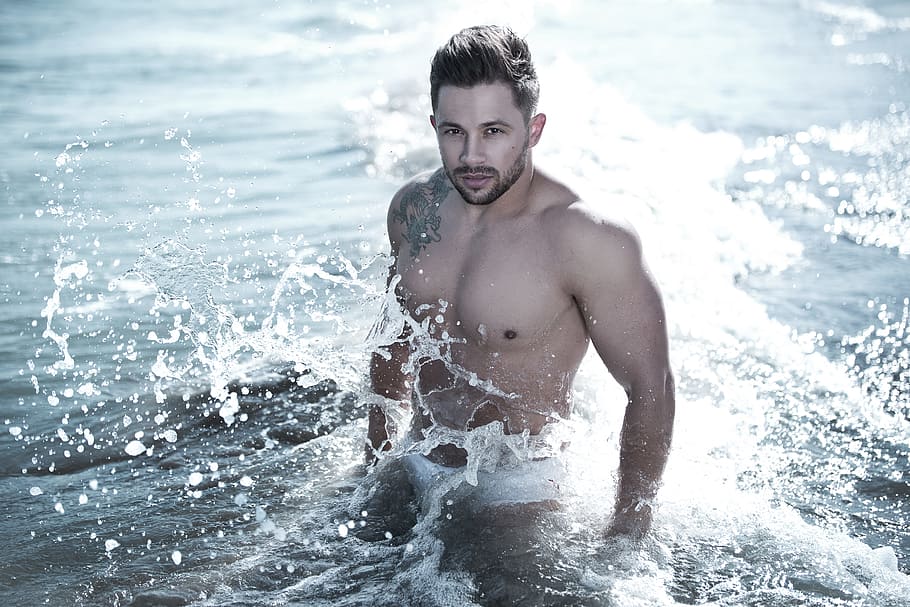 Photo of Man in Body of Water Wearing White Brief, beach, beard HD wallpaper