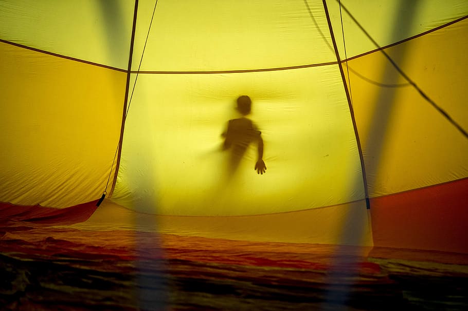 yellow and orange tent interior, person behind yellow tent, parachute HD wallpaper