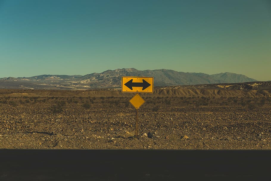 yellow and black arrow sign, arrows, barren, direction, mountains HD wallpaper