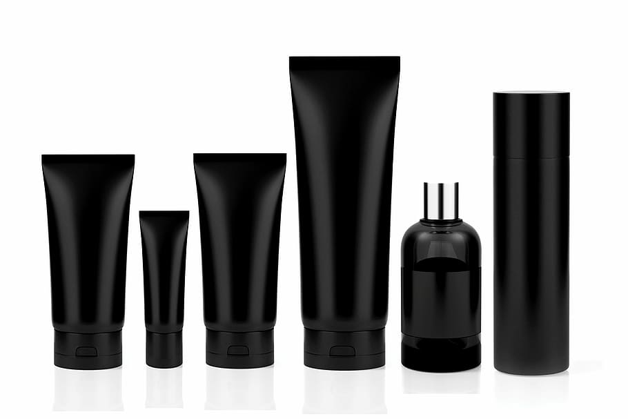 black soft tubes on white surface, cosmetics, set, perfume, bottle