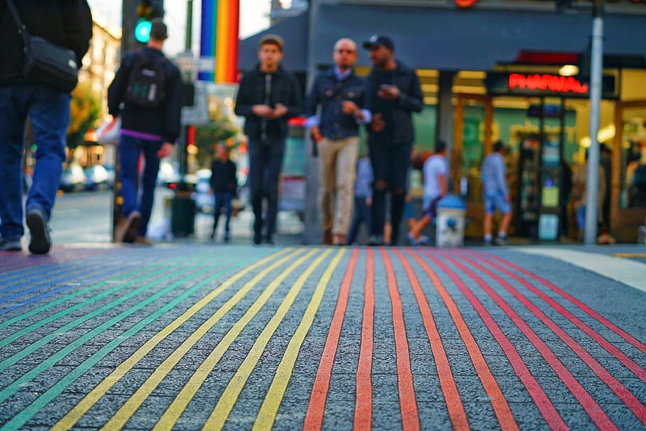 shallow focus photography of people walking on street, three person walking on the street HD wallpaper