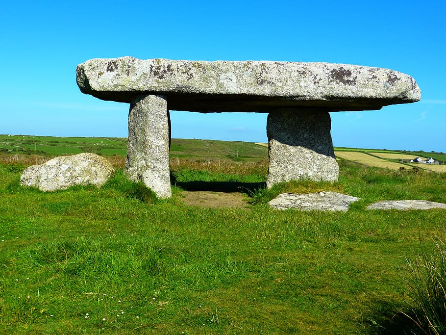 gray stonehenge during daytime, lanyon quoit, dolmen, quoit giant's