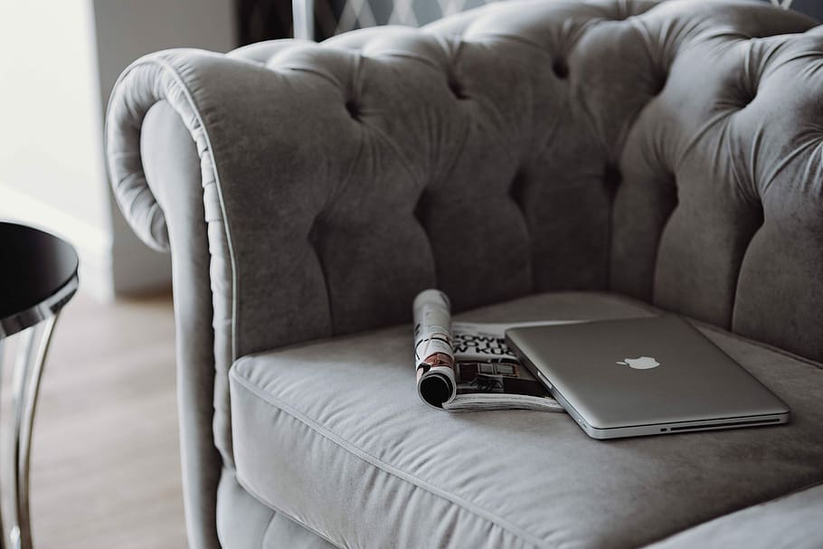 Elegant grey sofa with a laptop, an iPhone and a magazine, furniture, HD wallpaper