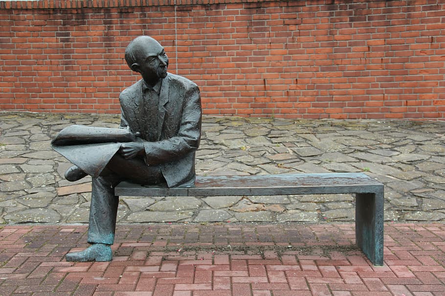 man sitting on bench holding paper statue, newspaper, read HD wallpaper