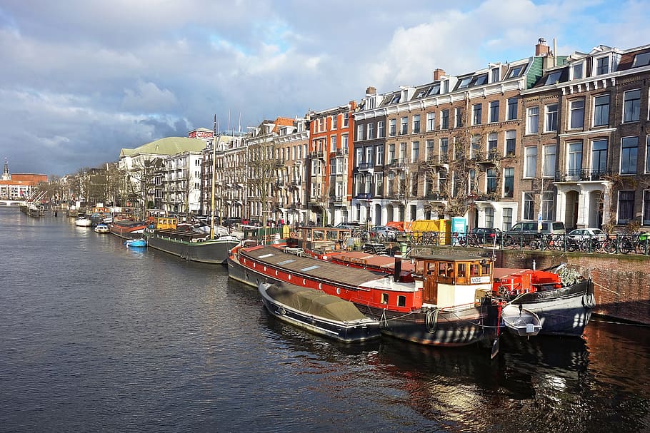 boat on water near city establishments, canal, building, amsterdam, HD wallpaper