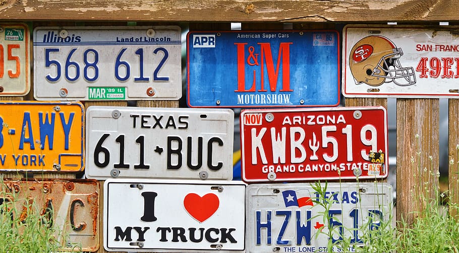 assorted vehicle plates on wooden fence, license plate, car shield, HD wallpaper