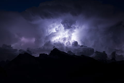 thunderstorm with lightning, mountain under cloudy sky during night HD wallpaper