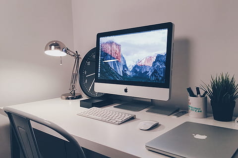 iMac computer and laptop on white office desk table, technology HD wallpaper