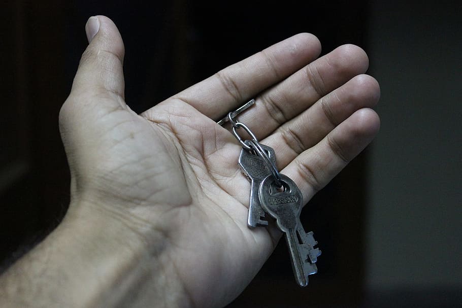 grey metal keys on left hand, open, chain, bunch, symbolic HD wallpaper