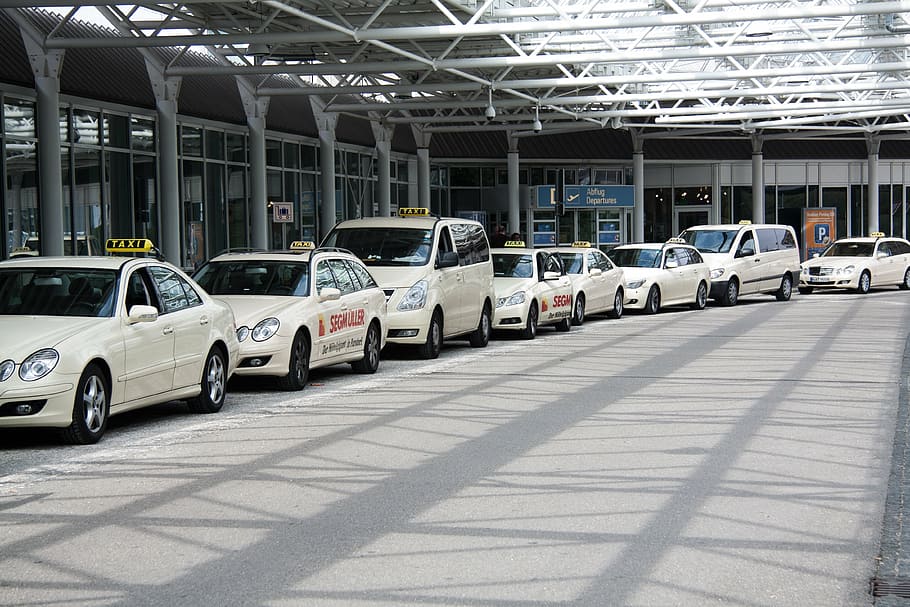 line of white vehicles, airport, international, munich, architecture