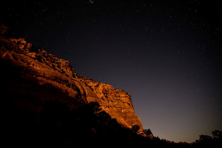 brown mountain, worm's eye view photography of rock formation HD wallpaper