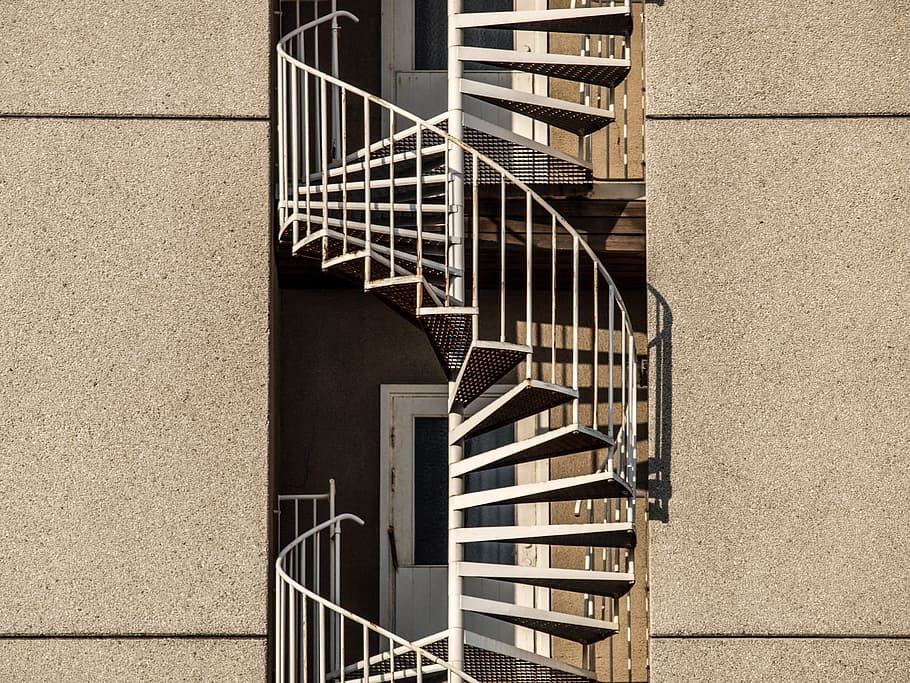 spiral stairs between concrete buildings, architecture, skyscraper HD wallpaper