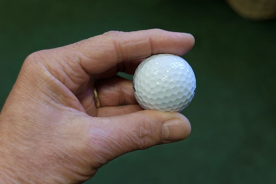 person holds white golf ball, hand, sport, game, recreation, leisure, HD wallpaper