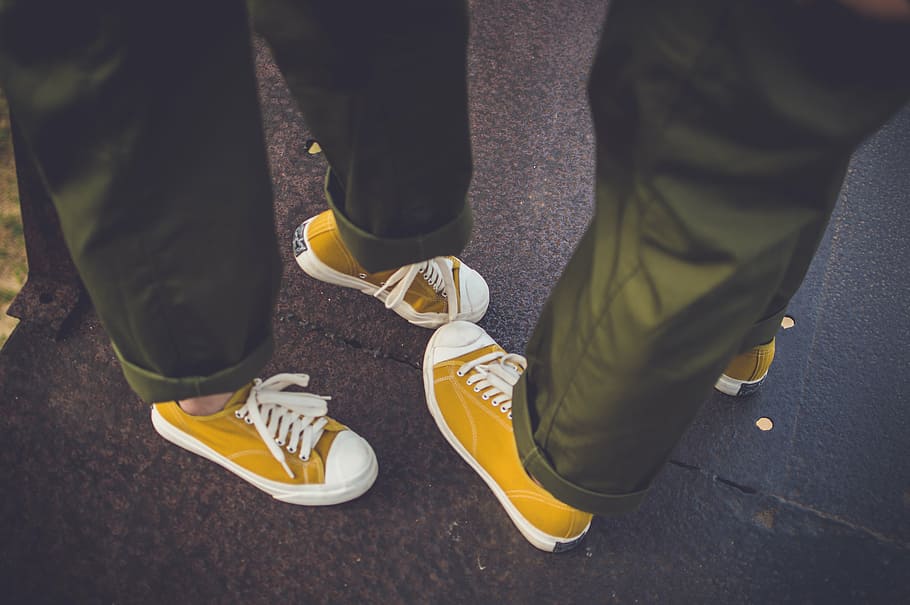 matching pairs of yellow low-top sneakers, person, wearing, white, HD wallpaper