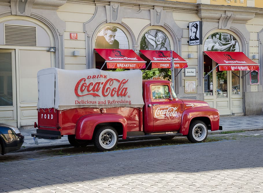 Coca-cola single cab truck in front of building, Prague, Europe