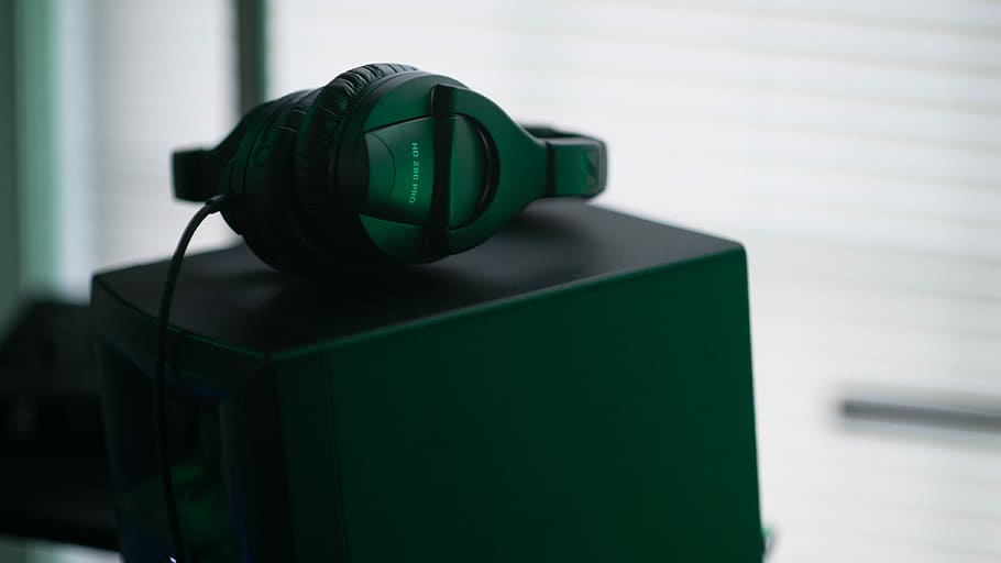 black corded headphones on black metal strcuture, equipment, green color HD wallpaper