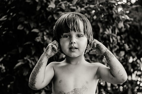 grayscale photo of a boy touching his ears, child, black And White HD wallpaper