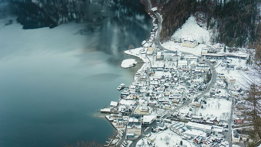 birds eye view of city building covered with snow, top view of body of water HD wallpaper