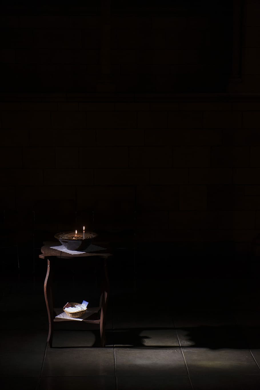 brown wooden table on dark area, lighted candle on black bowl on brown wooden table HD wallpaper