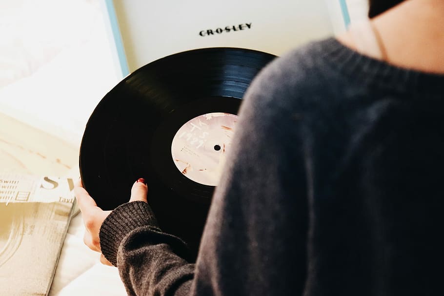 person holding black vinyl record, hand, arm, music, one person HD wallpaper