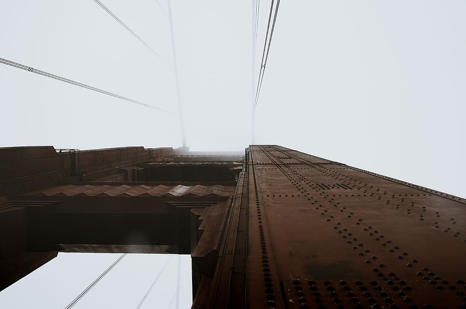 worm's-eye view photography of San Francisco Bridge during daytime, low angle view photography of building HD wallpaper