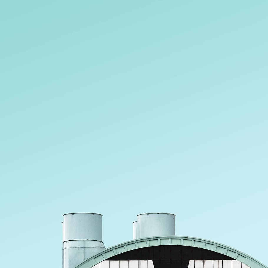 white and gray building pipes under white sky, white chimney over roof during daytime HD wallpaper