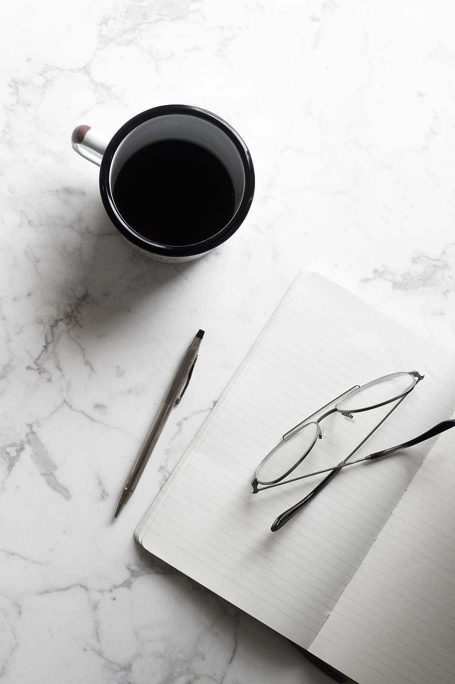 half-empty black and white ceramic mug near notebook, cup, coffee HD wallpaper