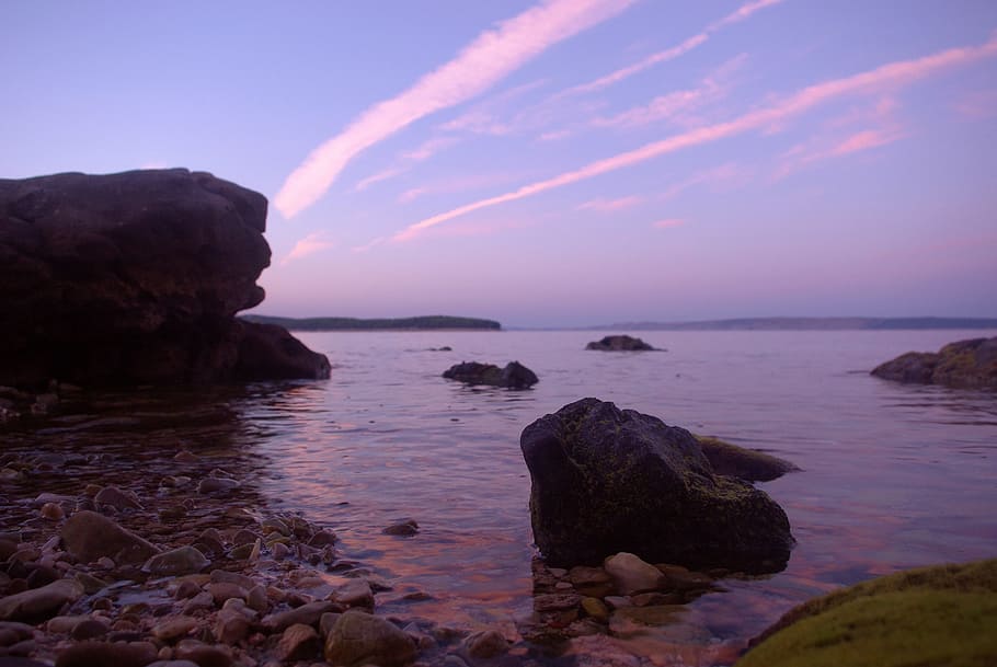 Rock Formation on Body of Water Under Altostratus Clouds, beach HD wallpaper