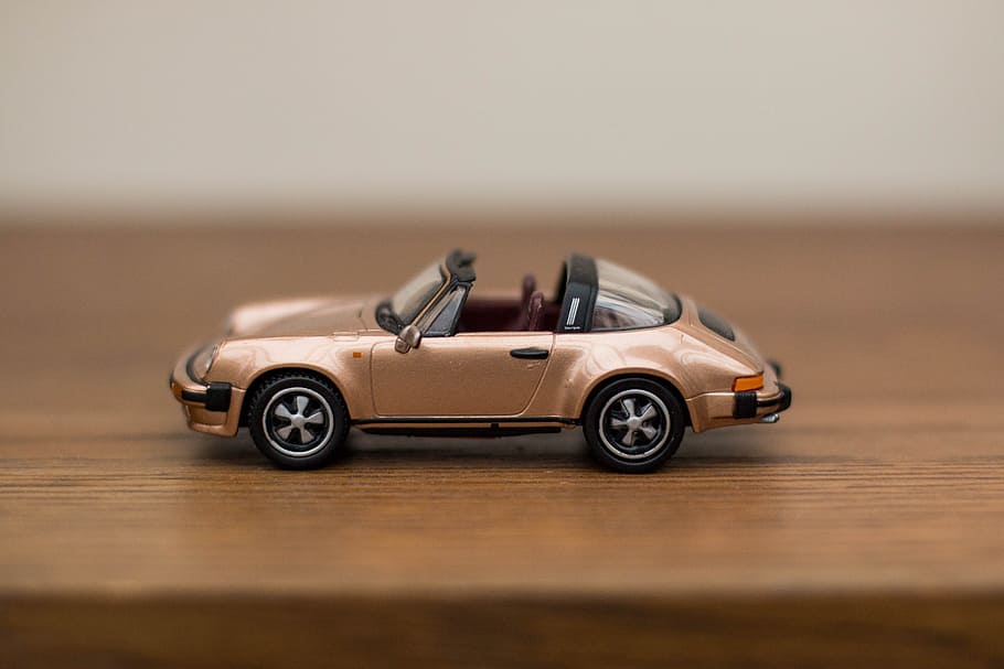 brown convertible car scale model in shallow focus shot, model car HD wallpaper