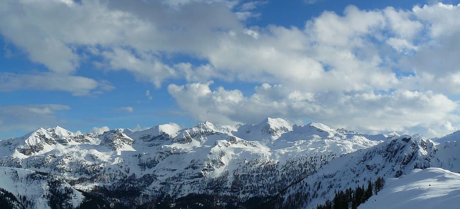 landscape photography of mountain alps under cumulus clouds HD wallpaper