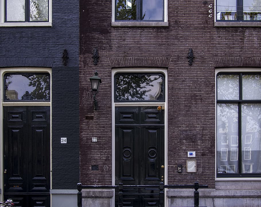 closed door building, black wooden door on brown brick building HD wallpaper