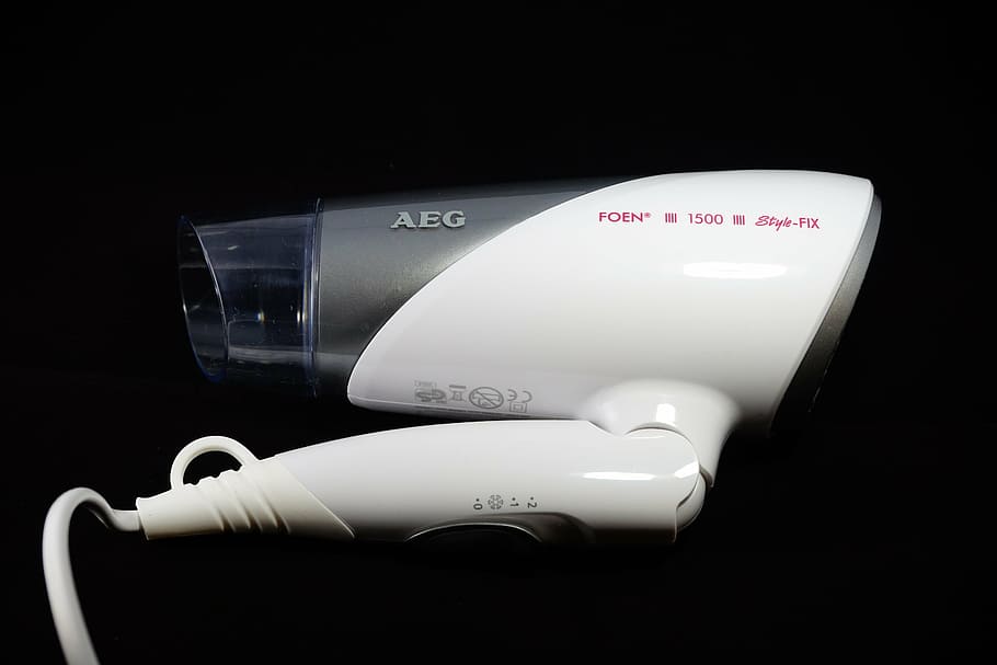 white AEG handheld vacuum cleaner, hairdryer, hair dryer, device