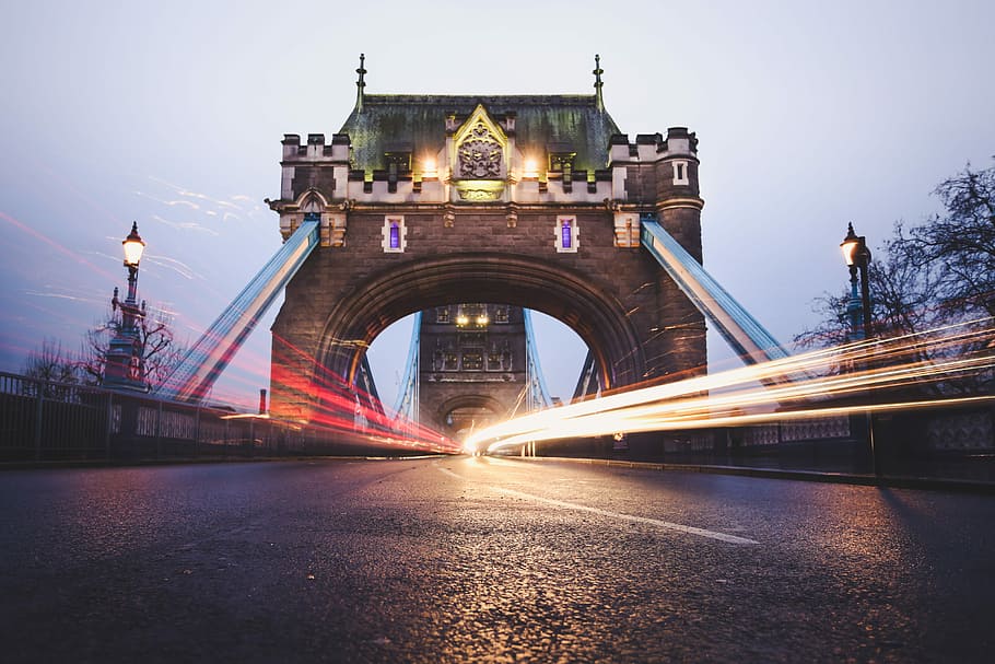 timelapse photography of city road at bridge, timelapse photography of vehicles passing thru the bridge near trees HD wallpaper