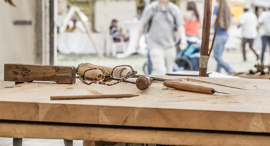 eyeglasses on top of table, brown wooden chisel on top of table HD wallpaper