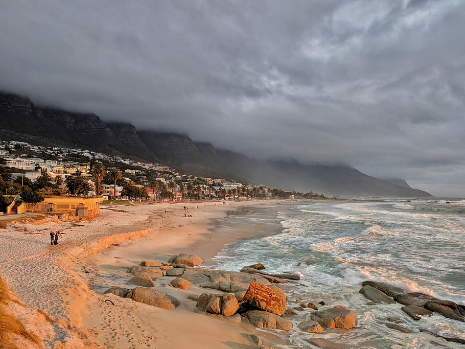 water crashing to rocks, body of water near the city, beach, surf HD wallpaper