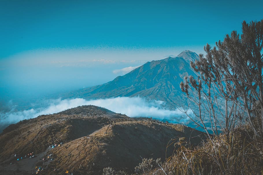 Landscape Photography of Mountain Surrounded by Sea of Clouds HD wallpaper